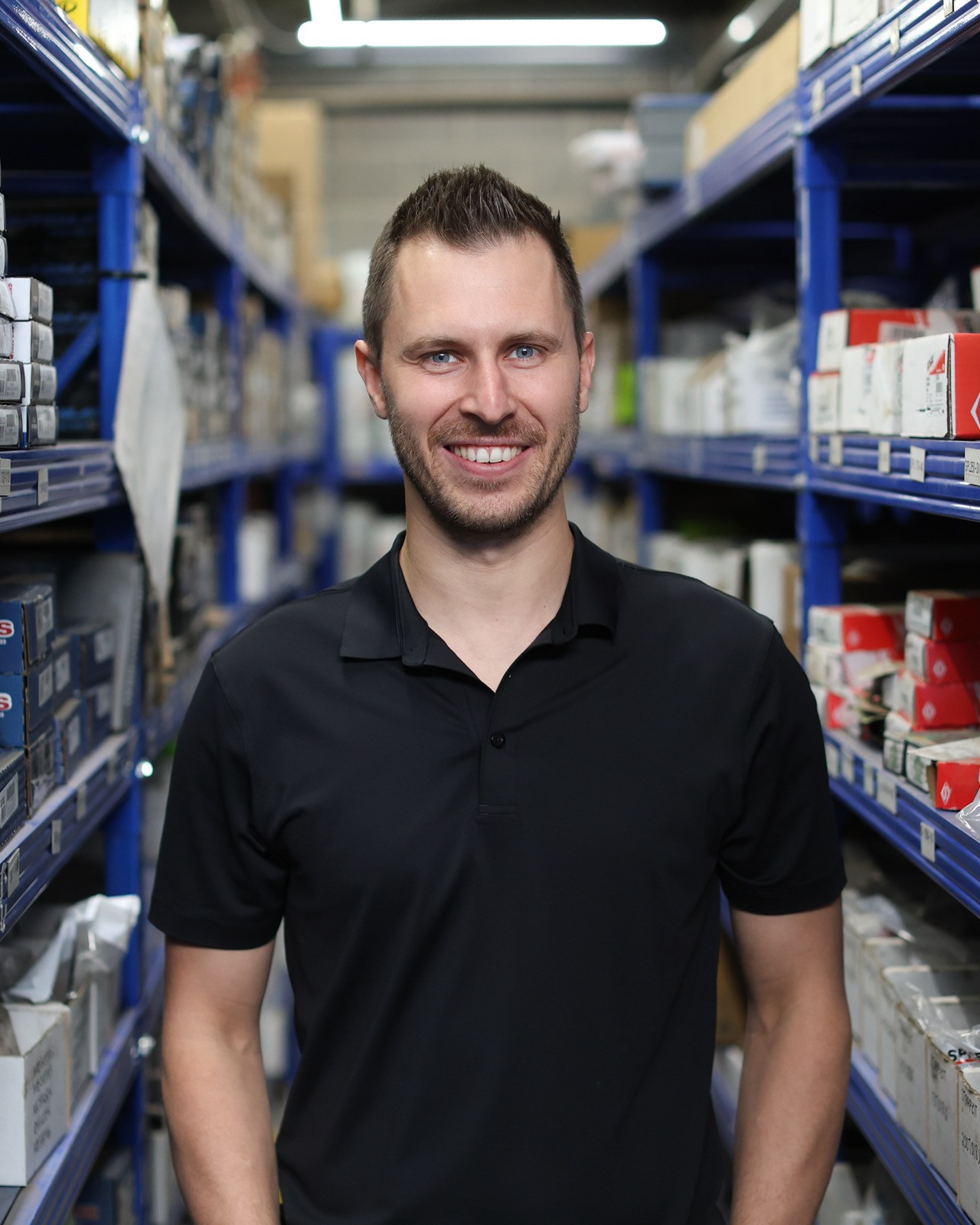 Fabian Bonjean standing in a Foothills Group parts aisle
